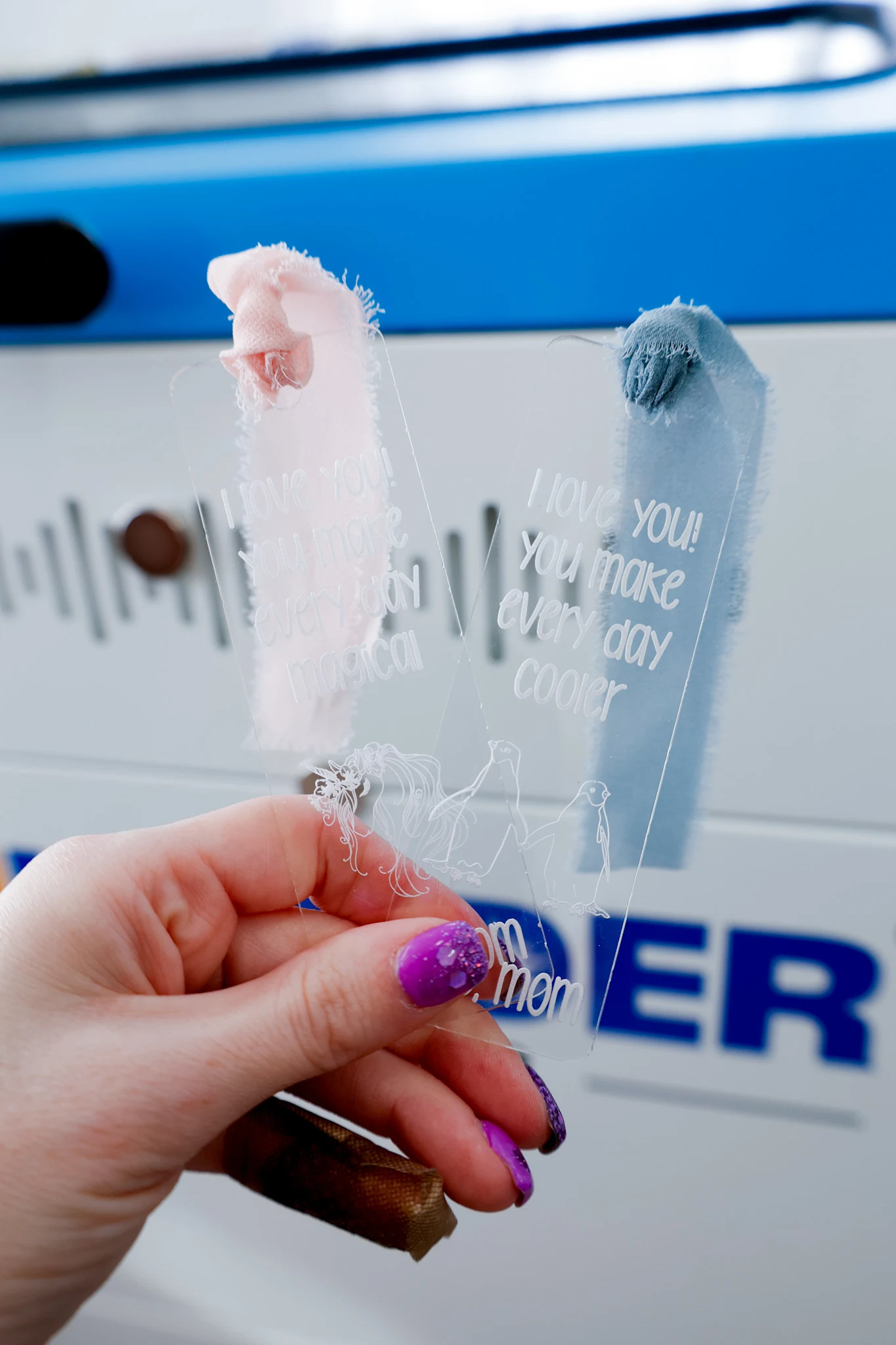 finshed laser engraved bookmarks with ribbons