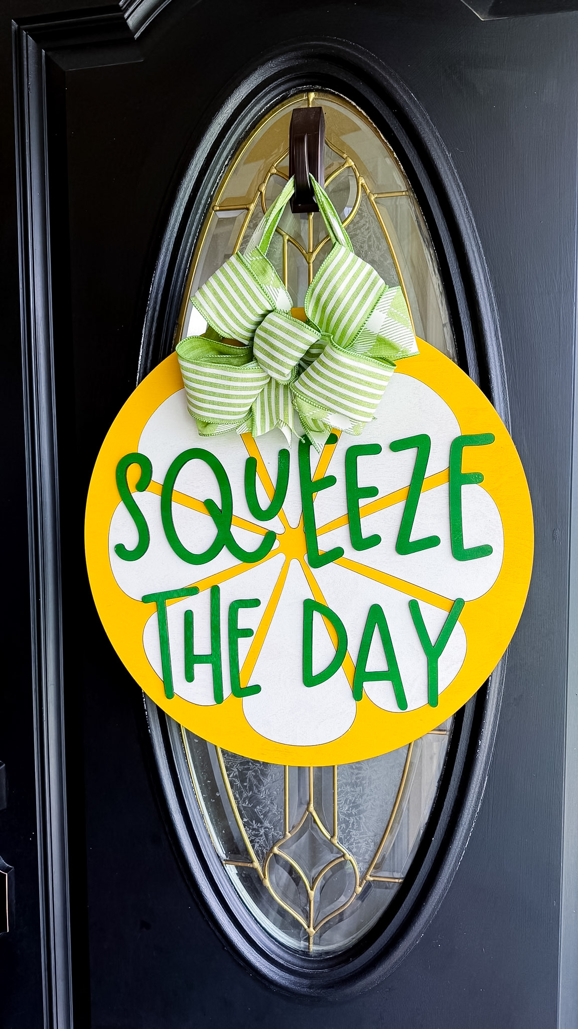 Finished laser cut wood sign: Squeeze The Day
